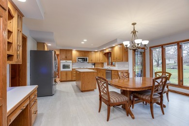 This well-maintained home is perfectly positioned on a spacious on St. Andrews Golf and Country Club in Illinois - for sale on GolfHomes.com, golf home, golf lot