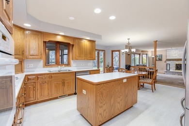 This well-maintained home is perfectly positioned on a spacious on St. Andrews Golf and Country Club in Illinois - for sale on GolfHomes.com, golf home, golf lot