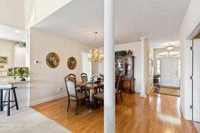 Discover the epitome of luxury living in this stunning end-unit on Lennon Hills Golf Course in North Carolina - for sale on GolfHomes.com, golf home, golf lot