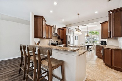 Step into this beautifully updated 4-bedroom, 2-bath home in the on Tampa Palms Golf and Country Club in Florida - for sale on GolfHomes.com, golf home, golf lot