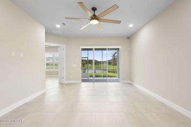 Step into easy living in Plantation Bay! This stylish 2-bedroom on Plantation Bay Golf and Country Club in Florida - for sale on GolfHomes.com, golf home, golf lot