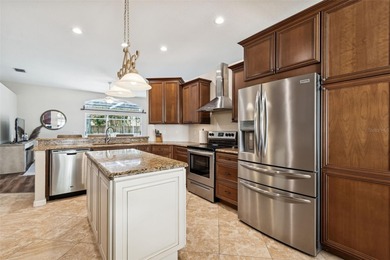 Step into this beautifully updated 4-bedroom, 2-bath home in the on Tampa Palms Golf and Country Club in Florida - for sale on GolfHomes.com, golf home, golf lot