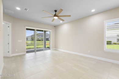 Step into easy living in Plantation Bay! This stylish 2-bedroom on Plantation Bay Golf and Country Club in Florida - for sale on GolfHomes.com, golf home, golf lot