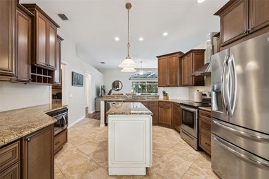 Step into this beautifully updated 4-bedroom, 2-bath home in the on Tampa Palms Golf and Country Club in Florida - for sale on GolfHomes.com, golf home, golf lot