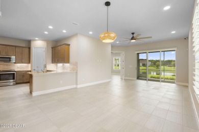 Step into easy living in Plantation Bay! This stylish 2-bedroom on Plantation Bay Golf and Country Club in Florida - for sale on GolfHomes.com, golf home, golf lot