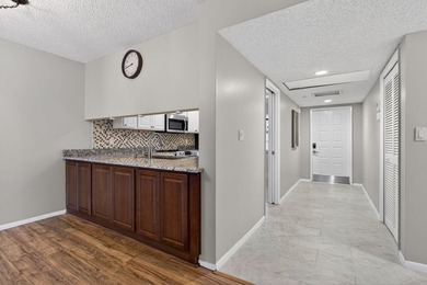 Move-in ready 2BR/2BA Palm Aire condo with expansive views. The on Palm-Aire Country Club and Resort - The Oaks in Florida - for sale on GolfHomes.com, golf home, golf lot