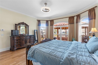 Welcome to an exceptional coastal retreat offering 5 bedrooms, 4 on Rocky Point Golf Course in Florida - for sale on GolfHomes.com, golf home, golf lot