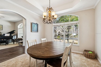 Step into this beautifully updated 4-bedroom, 2-bath home in the on Tampa Palms Golf and Country Club in Florida - for sale on GolfHomes.com, golf home, golf lot