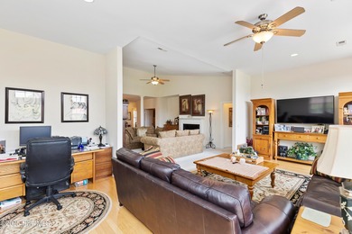 Discover the epitome of luxury living in this stunning end-unit on Lennon Hills Golf Course in North Carolina - for sale on GolfHomes.com, golf home, golf lot