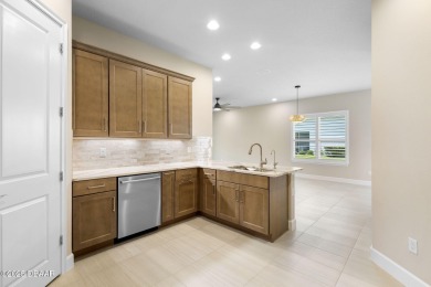 Step into easy living in Plantation Bay! This stylish 2-bedroom on Plantation Bay Golf and Country Club in Florida - for sale on GolfHomes.com, golf home, golf lot