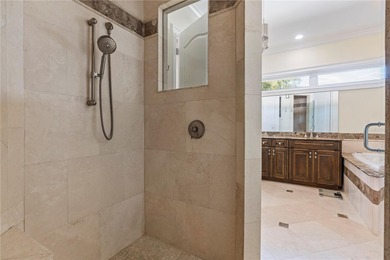 Welcome to an exceptional coastal retreat offering 5 bedrooms, 4 on Rocky Point Golf Course in Florida - for sale on GolfHomes.com, golf home, golf lot