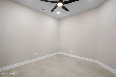 Step into easy living in Plantation Bay! This stylish 2-bedroom on Plantation Bay Golf and Country Club in Florida - for sale on GolfHomes.com, golf home, golf lot