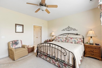 Discover the epitome of luxury living in this stunning end-unit on Lennon Hills Golf Course in North Carolina - for sale on GolfHomes.com, golf home, golf lot