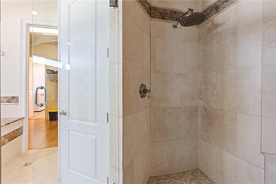 Welcome to an exceptional coastal retreat offering 5 bedrooms, 4 on Rocky Point Golf Course in Florida - for sale on GolfHomes.com, golf home, golf lot