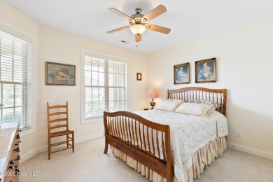 Discover the epitome of luxury living in this stunning end-unit on Lennon Hills Golf Course in North Carolina - for sale on GolfHomes.com, golf home, golf lot