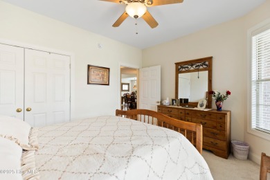 Discover the epitome of luxury living in this stunning end-unit on Lennon Hills Golf Course in North Carolina - for sale on GolfHomes.com, golf home, golf lot