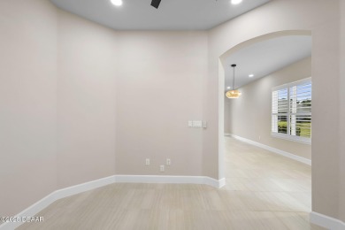 Step into easy living in Plantation Bay! This stylish 2-bedroom on Plantation Bay Golf and Country Club in Florida - for sale on GolfHomes.com, golf home, golf lot