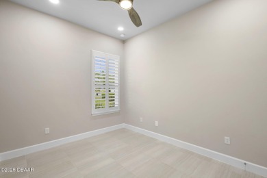 Step into easy living in Plantation Bay! This stylish 2-bedroom on Plantation Bay Golf and Country Club in Florida - for sale on GolfHomes.com, golf home, golf lot
