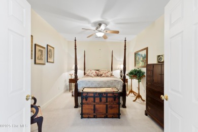 Discover the epitome of luxury living in this stunning end-unit on Lennon Hills Golf Course in North Carolina - for sale on GolfHomes.com, golf home, golf lot
