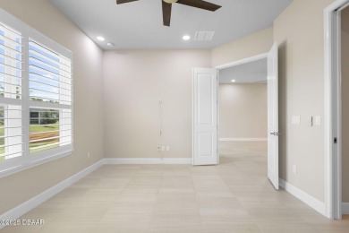 Step into easy living in Plantation Bay! This stylish 2-bedroom on Plantation Bay Golf and Country Club in Florida - for sale on GolfHomes.com, golf home, golf lot