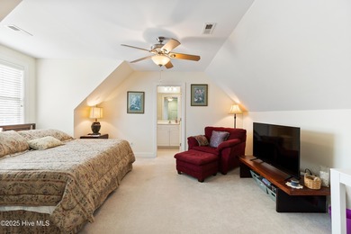 Discover the epitome of luxury living in this stunning end-unit on Lennon Hills Golf Course in North Carolina - for sale on GolfHomes.com, golf home, golf lot