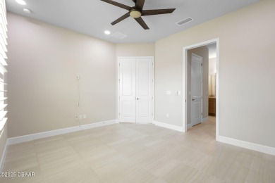 Step into easy living in Plantation Bay! This stylish 2-bedroom on Plantation Bay Golf and Country Club in Florida - for sale on GolfHomes.com, golf home, golf lot