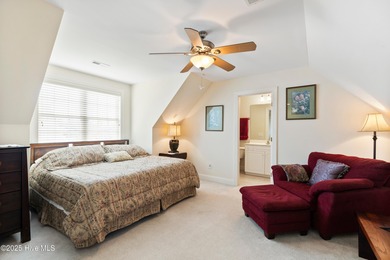 Discover the epitome of luxury living in this stunning end-unit on Lennon Hills Golf Course in North Carolina - for sale on GolfHomes.com, golf home, golf lot