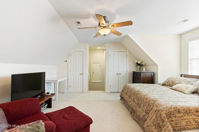 Discover the epitome of luxury living in this stunning end-unit on Lennon Hills Golf Course in North Carolina - for sale on GolfHomes.com, golf home, golf lot