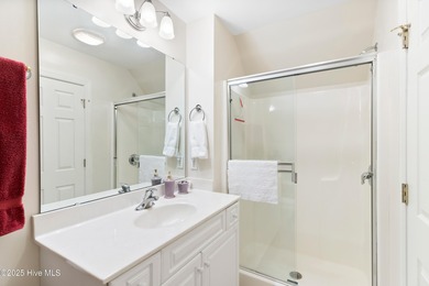 Discover the epitome of luxury living in this stunning end-unit on Lennon Hills Golf Course in North Carolina - for sale on GolfHomes.com, golf home, golf lot