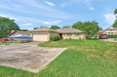 This great home is located just a quick walk or golf cart ride on Lake Kiowa Golf Course in Texas - for sale on GolfHomes.com, golf home, golf lot