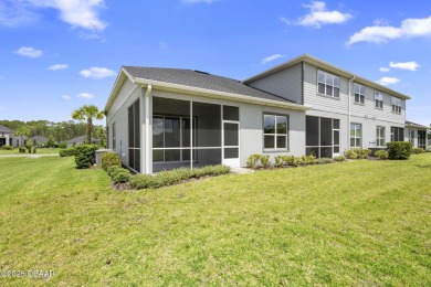 Step into easy living in Plantation Bay! This stylish 2-bedroom on Plantation Bay Golf and Country Club in Florida - for sale on GolfHomes.com, golf home, golf lot