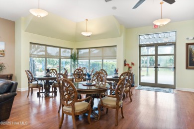 Discover the epitome of luxury living in this stunning end-unit on Lennon Hills Golf Course in North Carolina - for sale on GolfHomes.com, golf home, golf lot