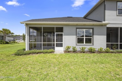 Step into easy living in Plantation Bay! This stylish 2-bedroom on Plantation Bay Golf and Country Club in Florida - for sale on GolfHomes.com, golf home, golf lot