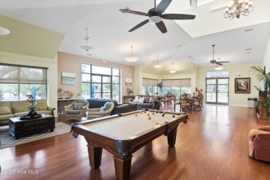 Discover the epitome of luxury living in this stunning end-unit on Lennon Hills Golf Course in North Carolina - for sale on GolfHomes.com, golf home, golf lot