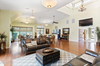 Discover the epitome of luxury living in this stunning end-unit on Lennon Hills Golf Course in North Carolina - for sale on GolfHomes.com, golf home, golf lot