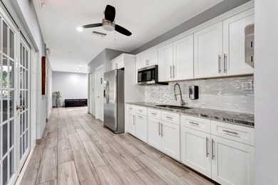 Move-in ready 2BR/2BA Palm Aire condo with expansive views. The on Palm-Aire Country Club and Resort - The Oaks in Florida - for sale on GolfHomes.com, golf home, golf lot