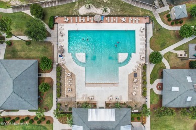 Discover the epitome of luxury living in this stunning end-unit on Lennon Hills Golf Course in North Carolina - for sale on GolfHomes.com, golf home, golf lot