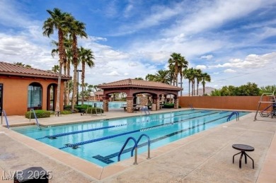 Experience resort-style elegance in this 3-bedroom, 2-bath home on Tuscany Golf Club in Nevada - for sale on GolfHomes.com, golf home, golf lot