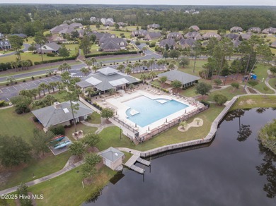 Discover the epitome of luxury living in this stunning end-unit on Lennon Hills Golf Course in North Carolina - for sale on GolfHomes.com, golf home, golf lot