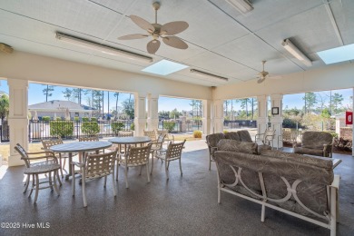 Discover the epitome of luxury living in this stunning end-unit on Lennon Hills Golf Course in North Carolina - for sale on GolfHomes.com, golf home, golf lot