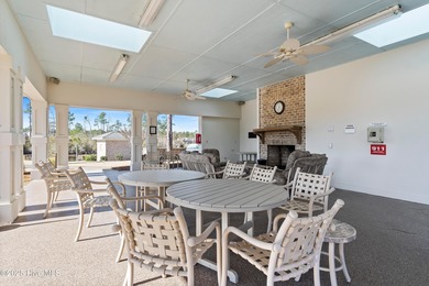 Discover the epitome of luxury living in this stunning end-unit on Lennon Hills Golf Course in North Carolina - for sale on GolfHomes.com, golf home, golf lot