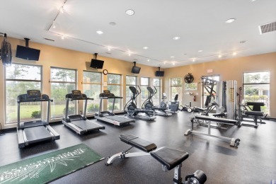 Discover the epitome of luxury living in this stunning end-unit on Lennon Hills Golf Course in North Carolina - for sale on GolfHomes.com, golf home, golf lot