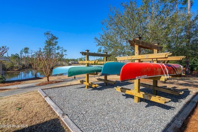 Discover the epitome of luxury living in this stunning end-unit on Lennon Hills Golf Course in North Carolina - for sale on GolfHomes.com, golf home, golf lot