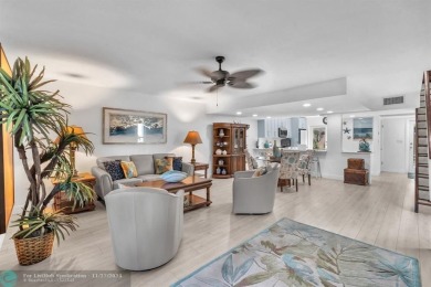 Experience modern elegance in this beautifully updated 2-bedroom on Palm-Aire Country Club and Resort - The Oaks in Florida - for sale on GolfHomes.com, golf home, golf lot