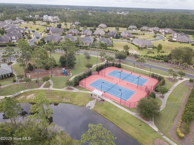 Discover the epitome of luxury living in this stunning end-unit on Lennon Hills Golf Course in North Carolina - for sale on GolfHomes.com, golf home, golf lot