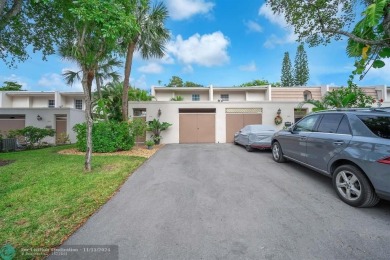 Experience modern elegance in this beautifully updated 2-bedroom on Palm-Aire Country Club and Resort - The Oaks in Florida - for sale on GolfHomes.com, golf home, golf lot