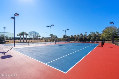 Discover the epitome of luxury living in this stunning end-unit on Lennon Hills Golf Course in North Carolina - for sale on GolfHomes.com, golf home, golf lot