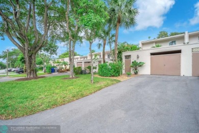 Experience modern elegance in this beautifully updated 2-bedroom on Palm-Aire Country Club and Resort - The Oaks in Florida - for sale on GolfHomes.com, golf home, golf lot