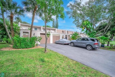 Experience modern elegance in this beautifully updated 2-bedroom on Palm-Aire Country Club and Resort - The Oaks in Florida - for sale on GolfHomes.com, golf home, golf lot