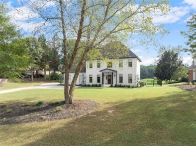 Absolutely stunning two-story home situated on the 6th fairway on Royal Lakes Golf and Country Club in Georgia - for sale on GolfHomes.com, golf home, golf lot